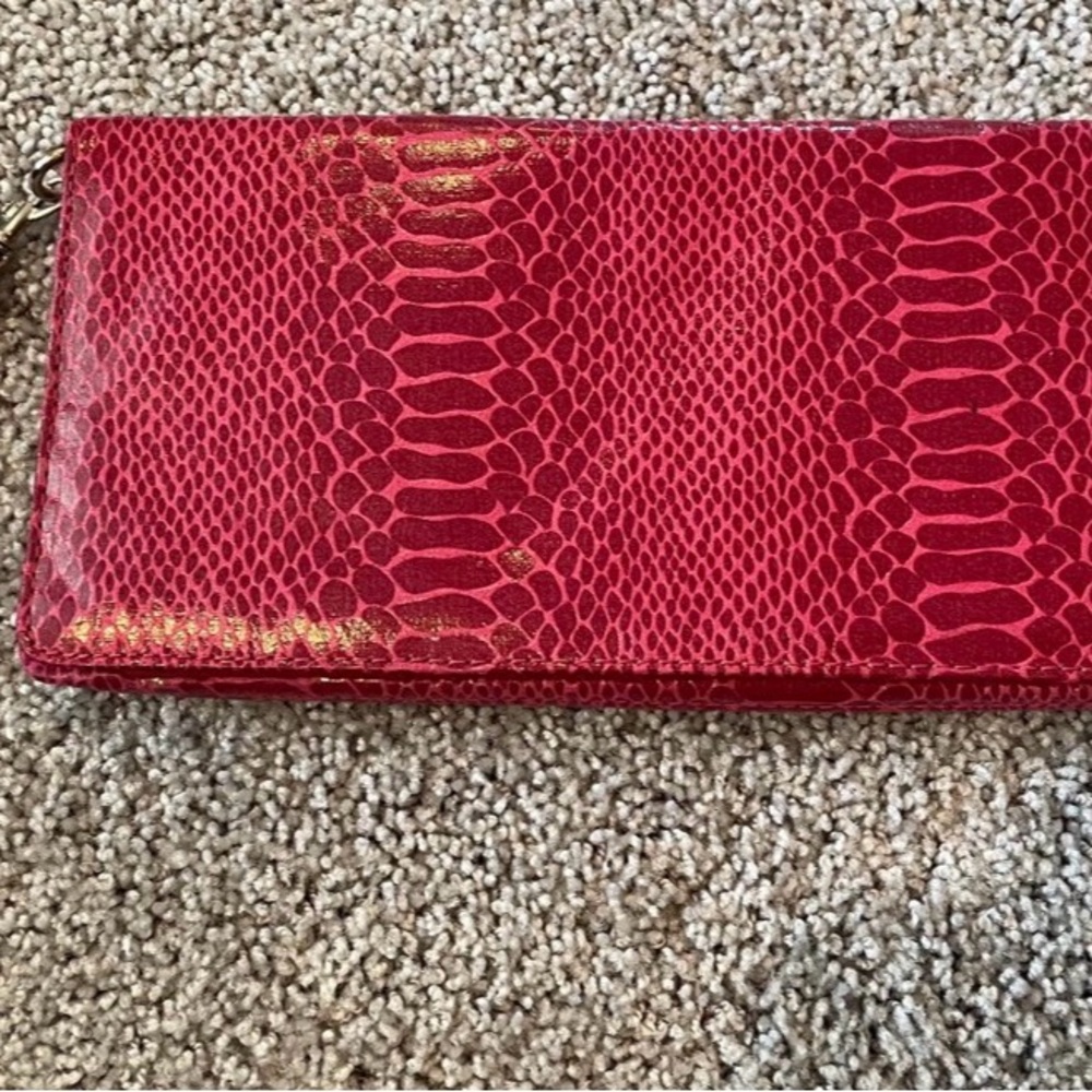 Fuchsia Snake-Embossed Wristlet Clutch